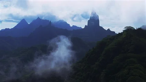 Moorea's dramatic volcanic tall jagged peaks rugged terrain Mount Rotui Mt Stock Footage 336397320