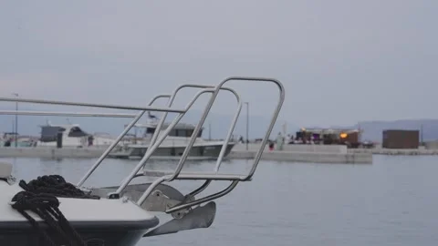 Moored Boat Bow with Anchor in Harbor at Dusk Stock Footage 340230040