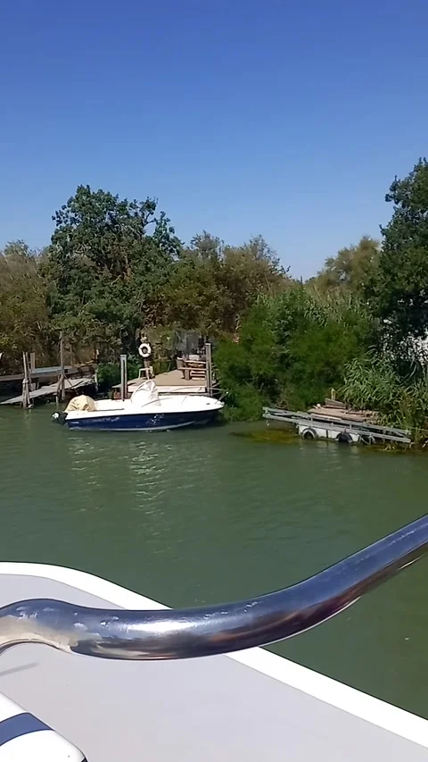 Moored boats along the river Video stock 313798889