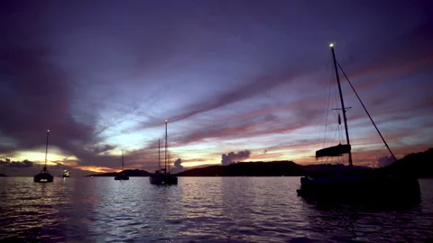 Moored catamarans against evening sky Stock Footage 246814672