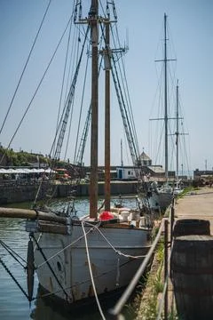 Moored Historic Vessel with Multiple Masts in Charlestown Harbour Waterway Stock Photos
