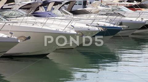 Moored motorboats Stock Photos