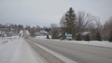 Moorefield Town Sign With Traffic Stock Footage 106885484