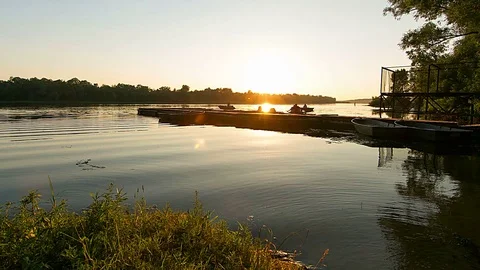 Mooring for boats at sunset Video stock 95013389