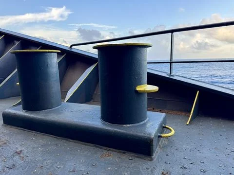 Mooring Bollards on Container Ship Deck with Open Sea Background Stock Photos