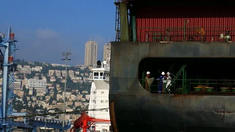 Mooring crew on board a ship that sails backwards Stock-Footage 95311902