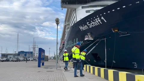Mooring Line Pulled Ashore Mein Schiff 1 Docking in Klaipeda, June 6, 2024 Stock Footage 307325754