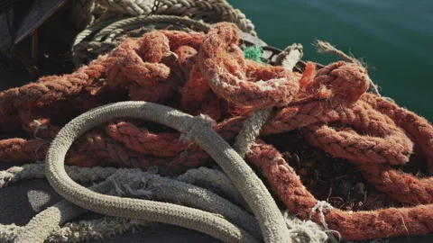 Mooring ropes twirled on the dock Video stock 278889449