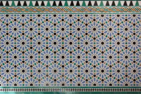 Moorish Islamic geometric patterns inside palace Stock Photos