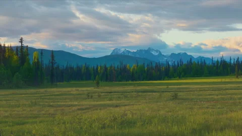 The Mooses Tooth with clouds at sunset Stock Footage 341534623