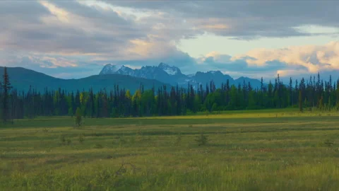 The Mooses Tooth with clouds at sunset Stock Footage 341536095