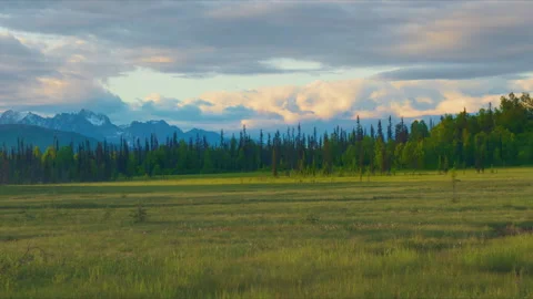 The Mooses Tooth with clouds at sunset Stock Footage 341536210