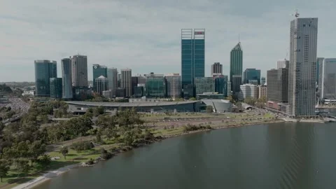 Mooth aerial drone shot overlooking Perth CBD and the Swan River, highlighting Stock Footage 344223191