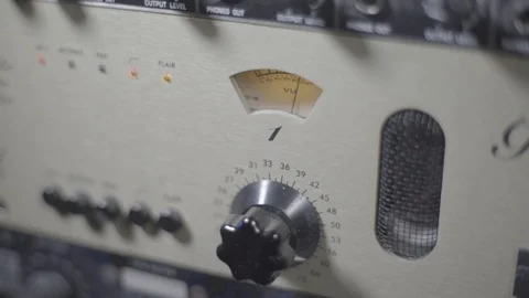 Mooving oldschool sound indicator on a studio gear, camera pan right Stock Footage 89835179