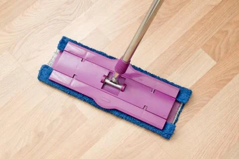 Mop on the floor close up Stock Photos