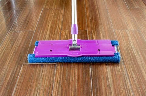 Mop on the floor close up Stock Photos