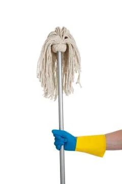 Mop held by a rubber gloved hand Stock Photos
