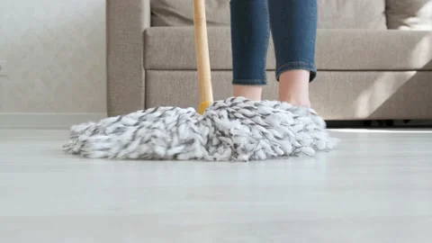 The MOP moves back and forth. House cleaning. Close up Stock Footage 140739958