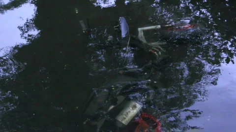 Moped in river 7 Video stock 862024