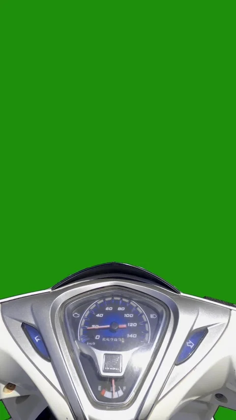 Moped while riding on a green screen Stock Footage 255360168