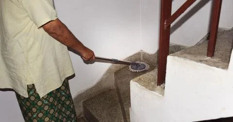 Mopping the Stairs Stock Photos