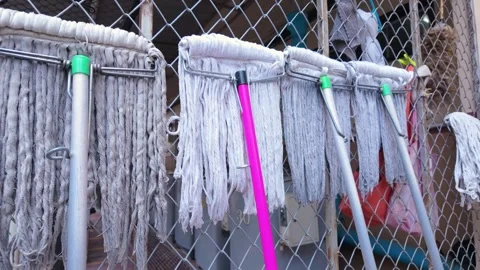 Mops Standing by the Wall: Cleaning Break Stock Footage 269278793