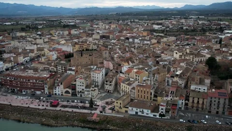 Mora de Ebro aerial view with village, river, and bridge in Catalonia, Spain 4K Video stock 308715811