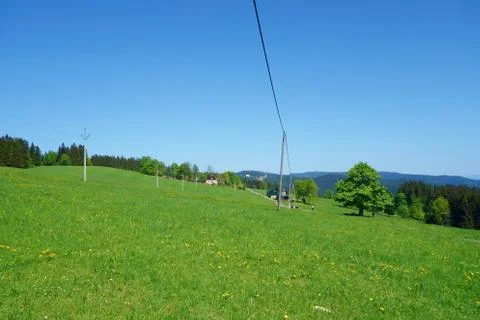 Moravian fields with a green meadow during spring overlooking the highest pea Stock Photos