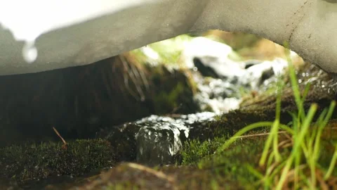 Moravice river spring source in the mountains snowmelt ice flowing flows clear 動画素材 336362976