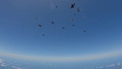 More than 100 skydivers together in a large formation. Stock Footage 341263749