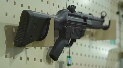 More Than 20 Units of Fire-Arms Machines on the White Wall Stock Footage 68605961