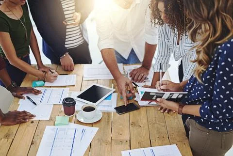 More hands equals more work being done. a group of unrecognizable businesspeople Stock Photos