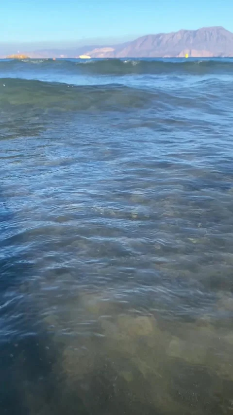 More. Sea waves. Mountains. Vertical video  Video stock 287498961