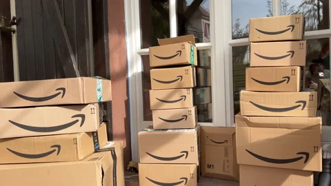 More than twenty of Amazon Prime Shipping cardboard packages cardboard boxes in Stock Footage 209570454