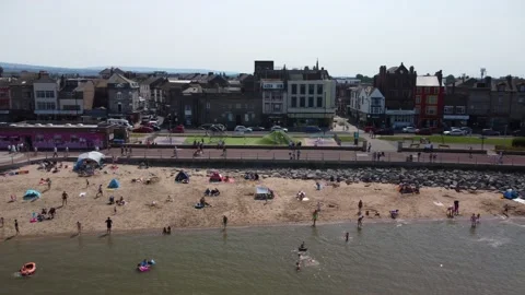 Morecambe - drone flies right to left showing beach and promenade Stock-Footage 204774233