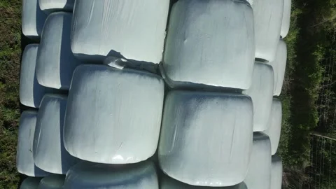 Moretonhampstead, Devon: DRONE VIEWS: Overhead shots of sealed hay bales (1) Stock Footage 264952393