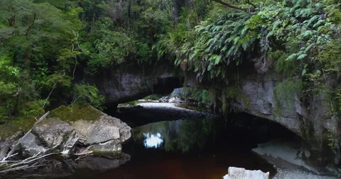 Moria Gate Arch on the Oparara River, Kahurangi National Park,New zealand Stock Footage 140686881