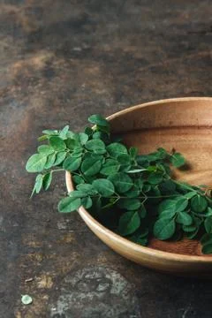 Moringa on rustic background Stock Photos