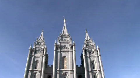 Mormon Temple SLC blue sky pan down reflection HD Stock Footage