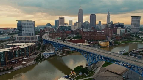 Morning aerial drone shot of downtown Cleveland, Ohio skyline with traffic Stock Footage