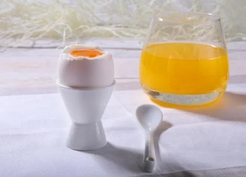 Morning Breakfast set with egg, bread toast and orange juice. Stock Photos