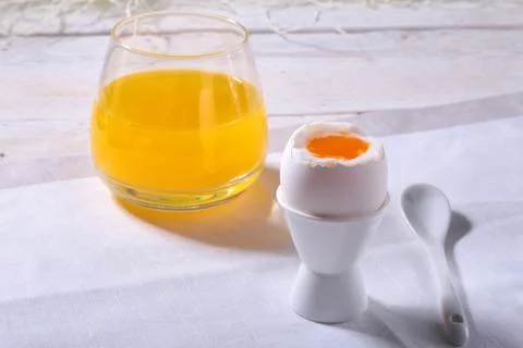 Morning Breakfast set with egg, bread toast and orange juice. Stock Photos