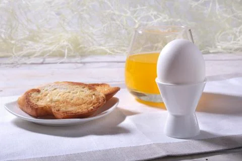 Morning Breakfast set with egg, bread toast and orange juice. Stock Photos