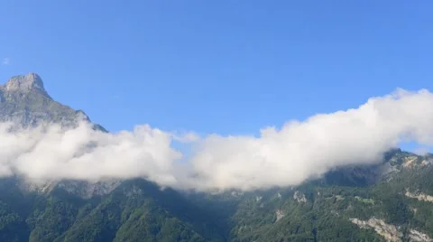 Morning clouds over the mountains. Stock Footage 54446961