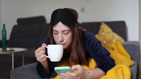Morning coffee and endless scrolling 스톡 동영상 341233512