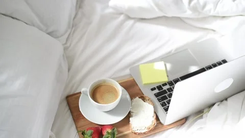 Morning coffee in bed. Stock Footage 168513907
