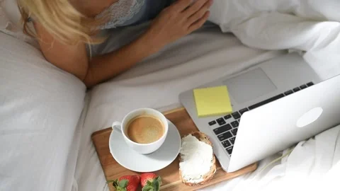Morning coffee in bed. Stock Footage 168514512