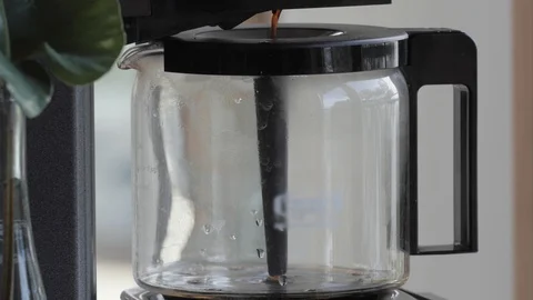 Morning Coffee - Coffee Maker Brewing Closeup - Working from home Stock Footage 129443665