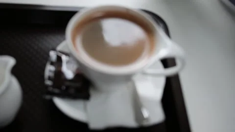 Morning coffee, Java, cream, water, at a cafe  in Bangkok Thailand Stock Footage 248891511