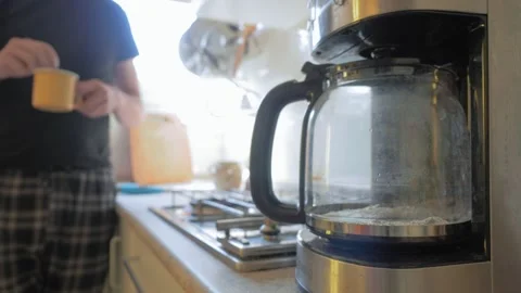 Morning coffee in the kitchen Stock Footage 132984196